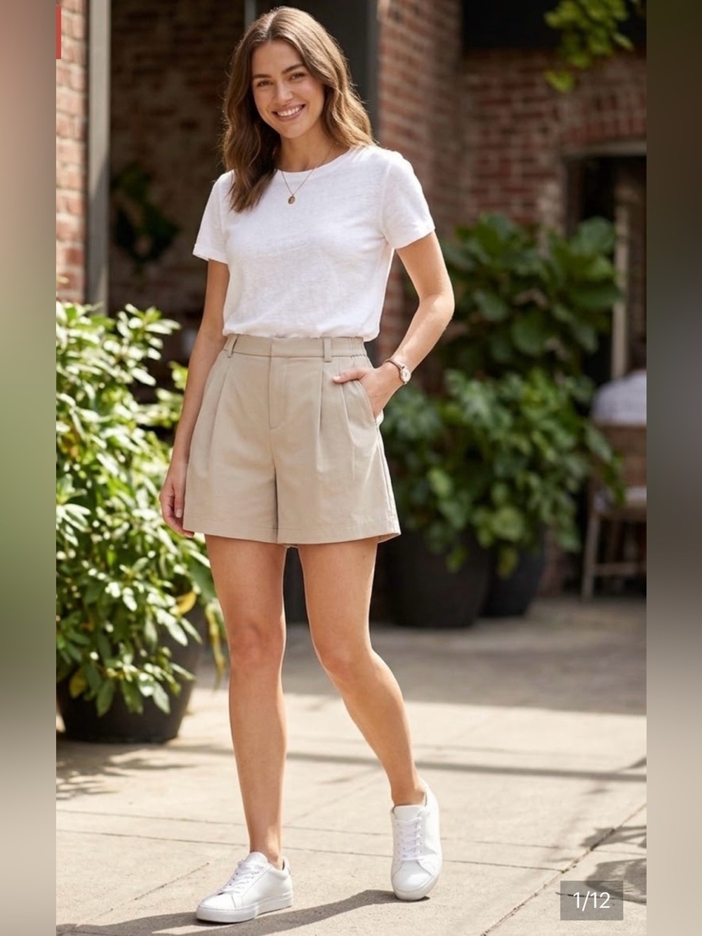 Vuori High-Rise Pleated Shorts in Beige